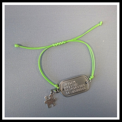 Armband SOS alle maten verstelbaar RVS met bedel puzzelstukje